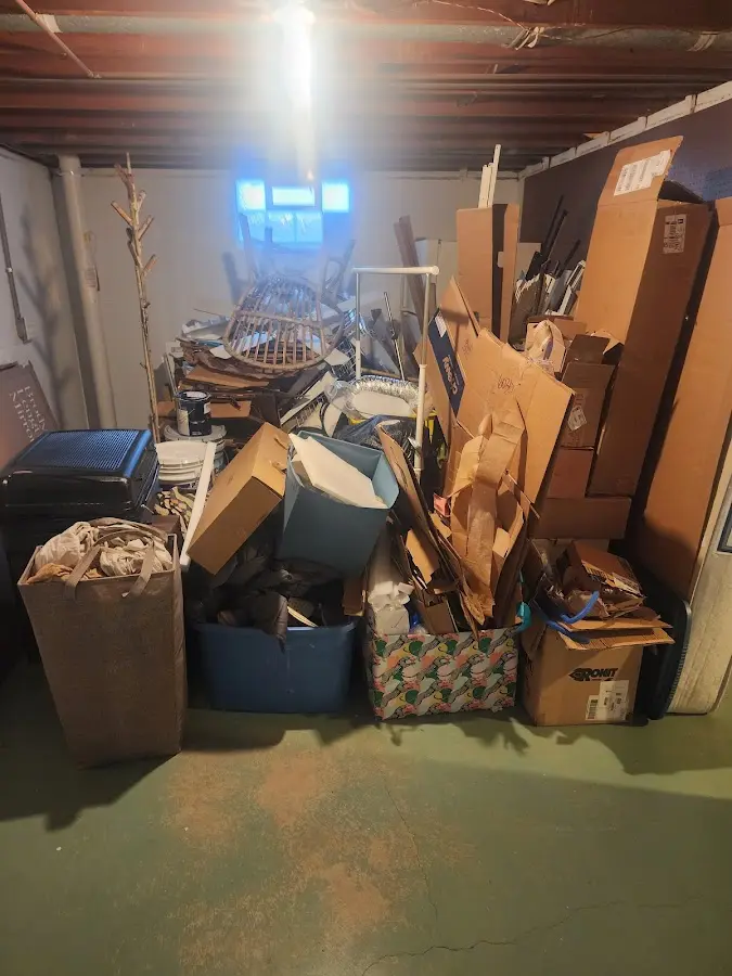 Roll-off dumpster container at job site for 2 Yard Dumpster Rental in Mustang